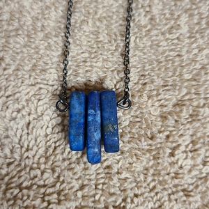 Black-ish chain with 3 blue marble stones